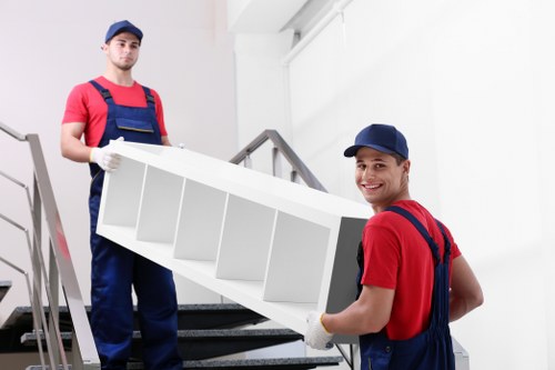 Furniture pick-up service collecting bulky items from a Mill Hill home