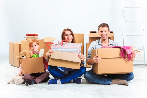 Professional van moving team prepared with safety gear and protective equipment
