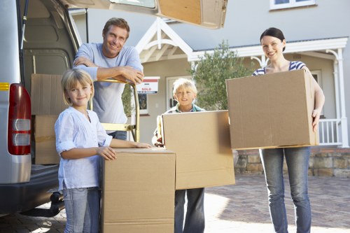House removals team planning a move in Mill Hill on a residential street