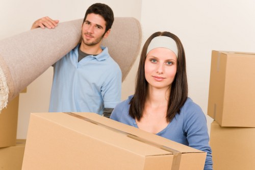 Packed moving boxes and furniture for a local relocation